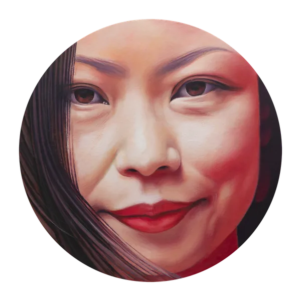 Close-up portrait of a smiling woman with dark hair and red lipstick