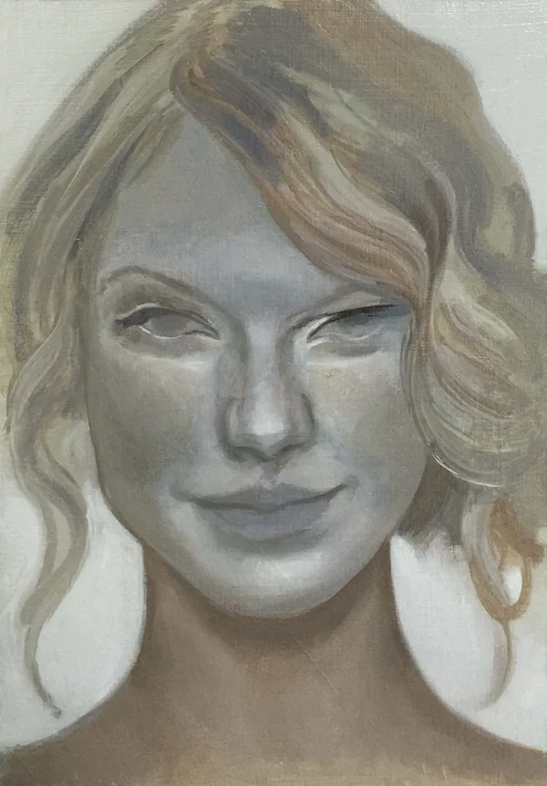 Muted portrait study of a woman with wavy blonde hair