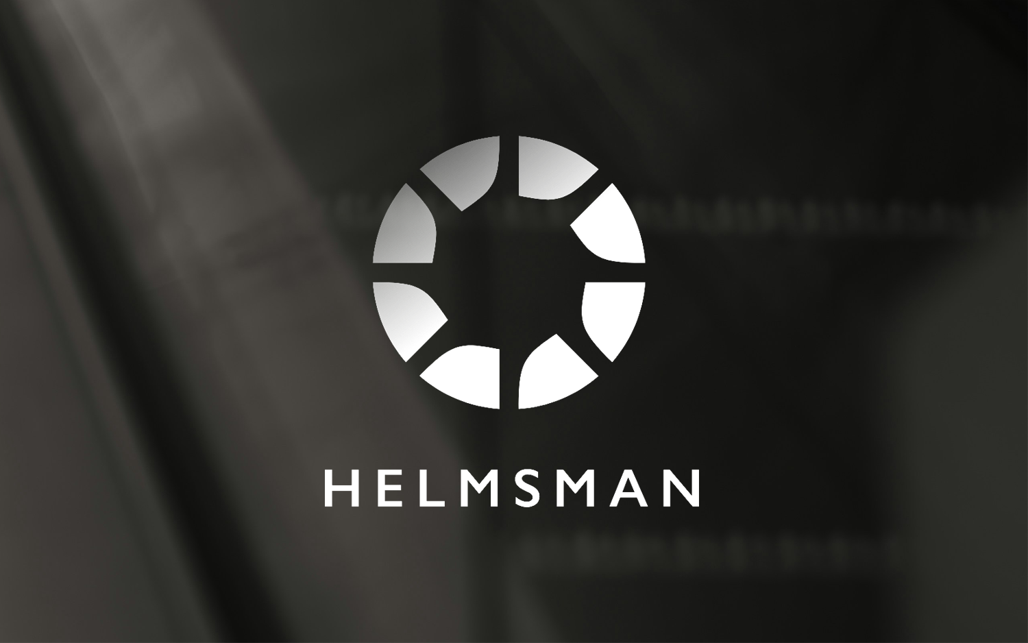 Helmsman logo: helm mark and wordmark